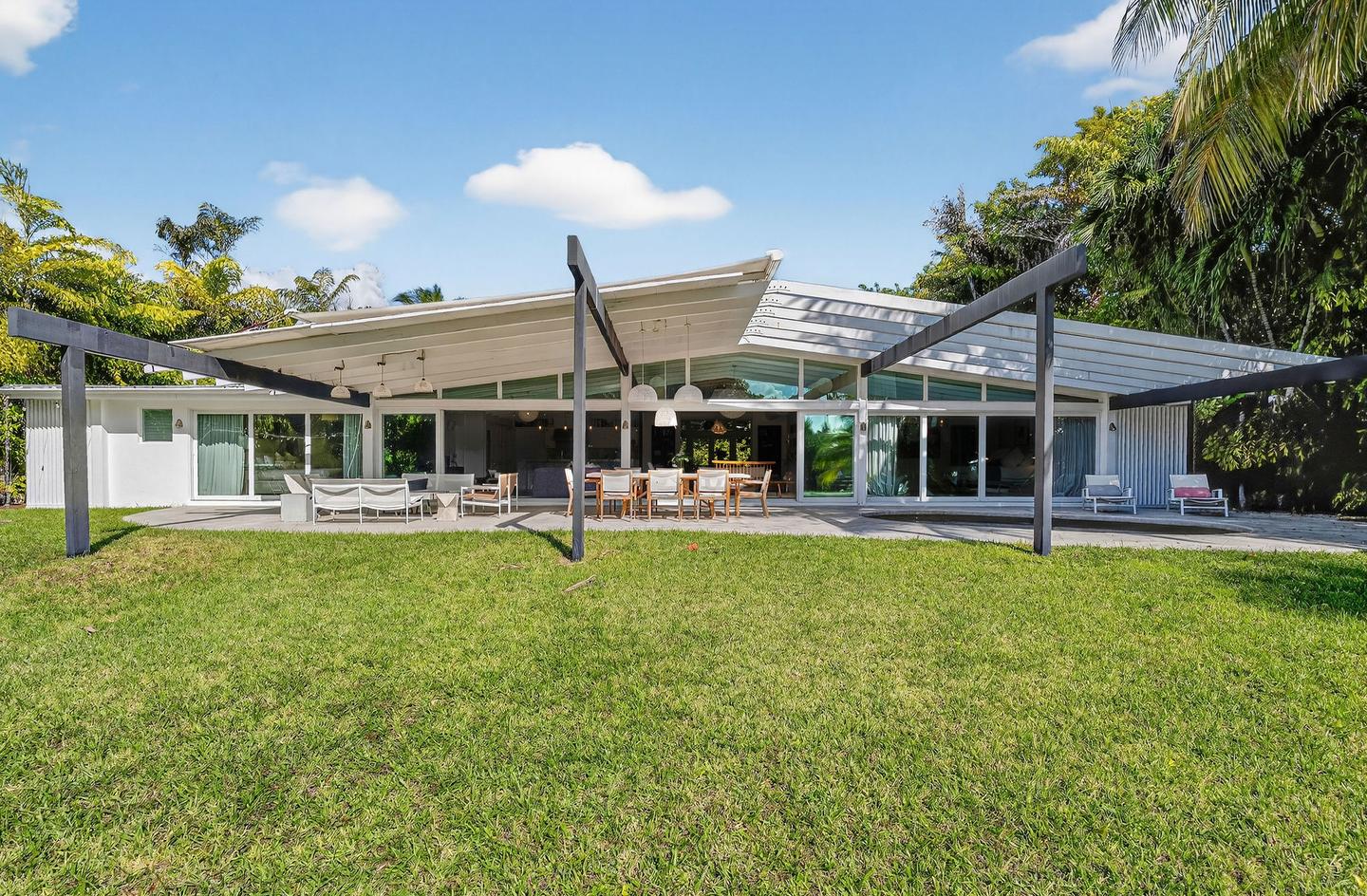 Full rear elevation with butterfly roof and covered outdoor patio