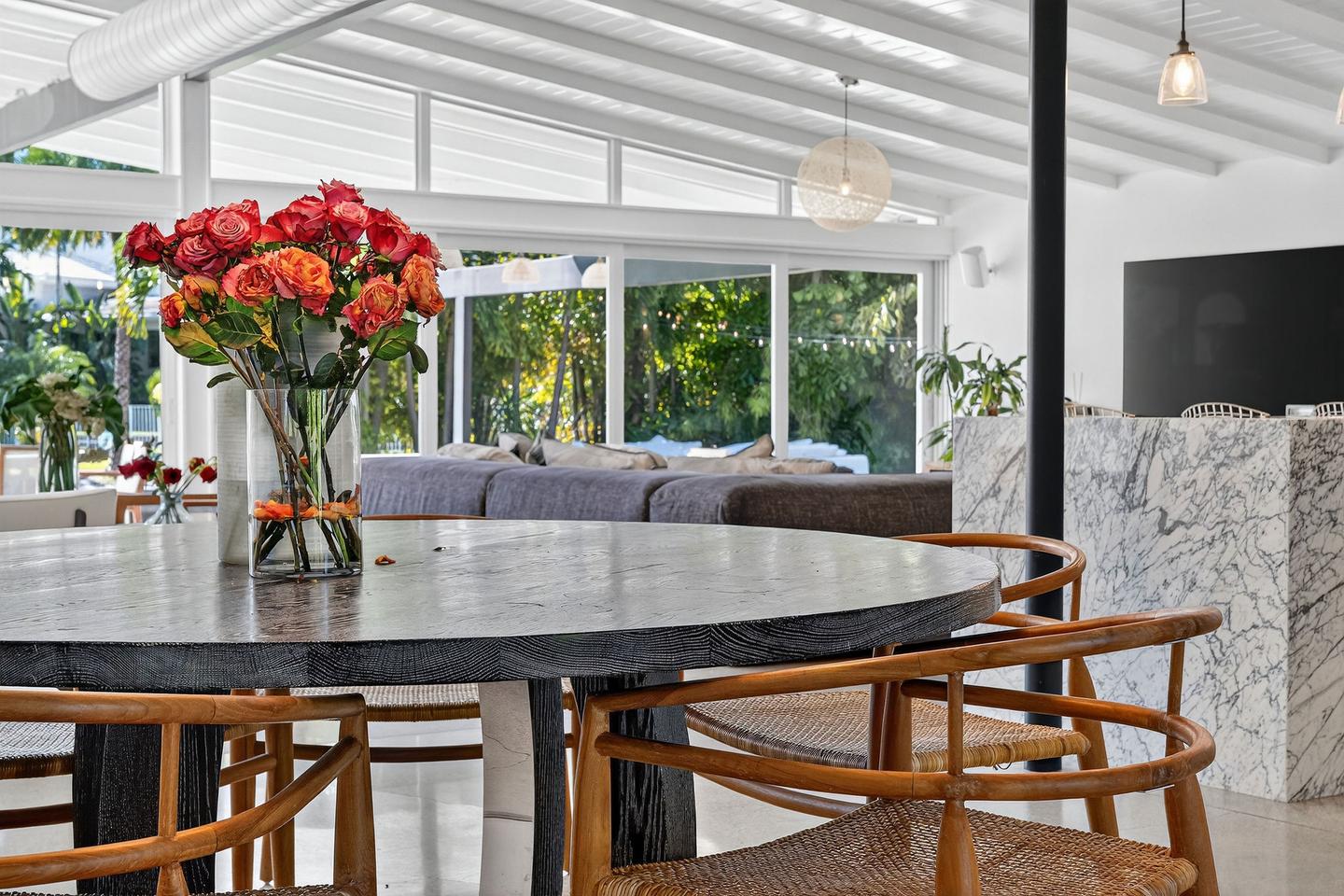Dining table detail with roses and marble counter