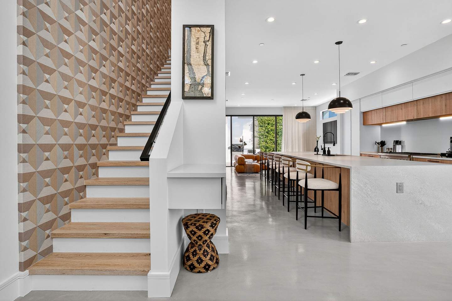 Interior staircase and kitchen — South Florida luxury home