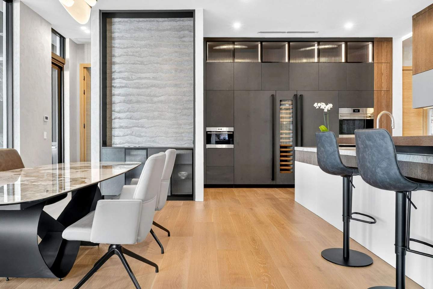 Professionally staged luxury dining room with carefully composed table setting and balanced lighting