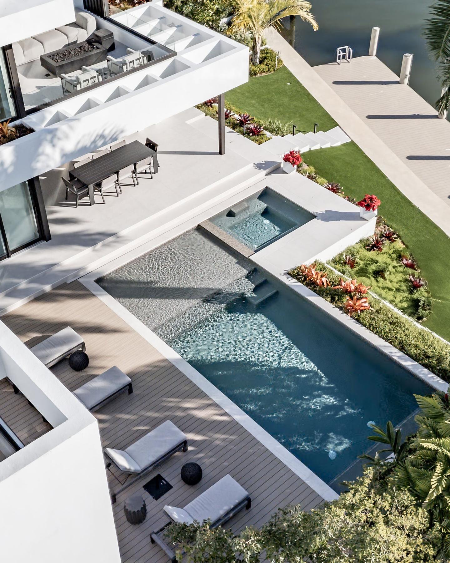 Aerial detail of pool, spa, and dock