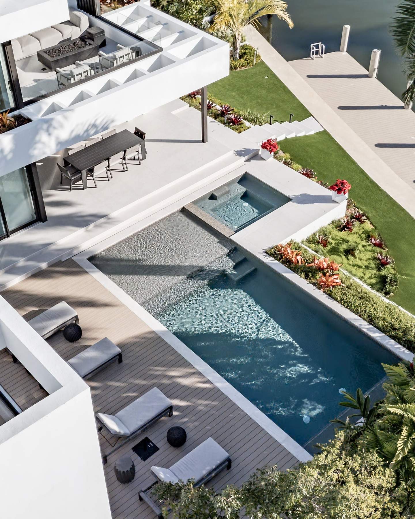 Aerial detail of pool, spa, and dock