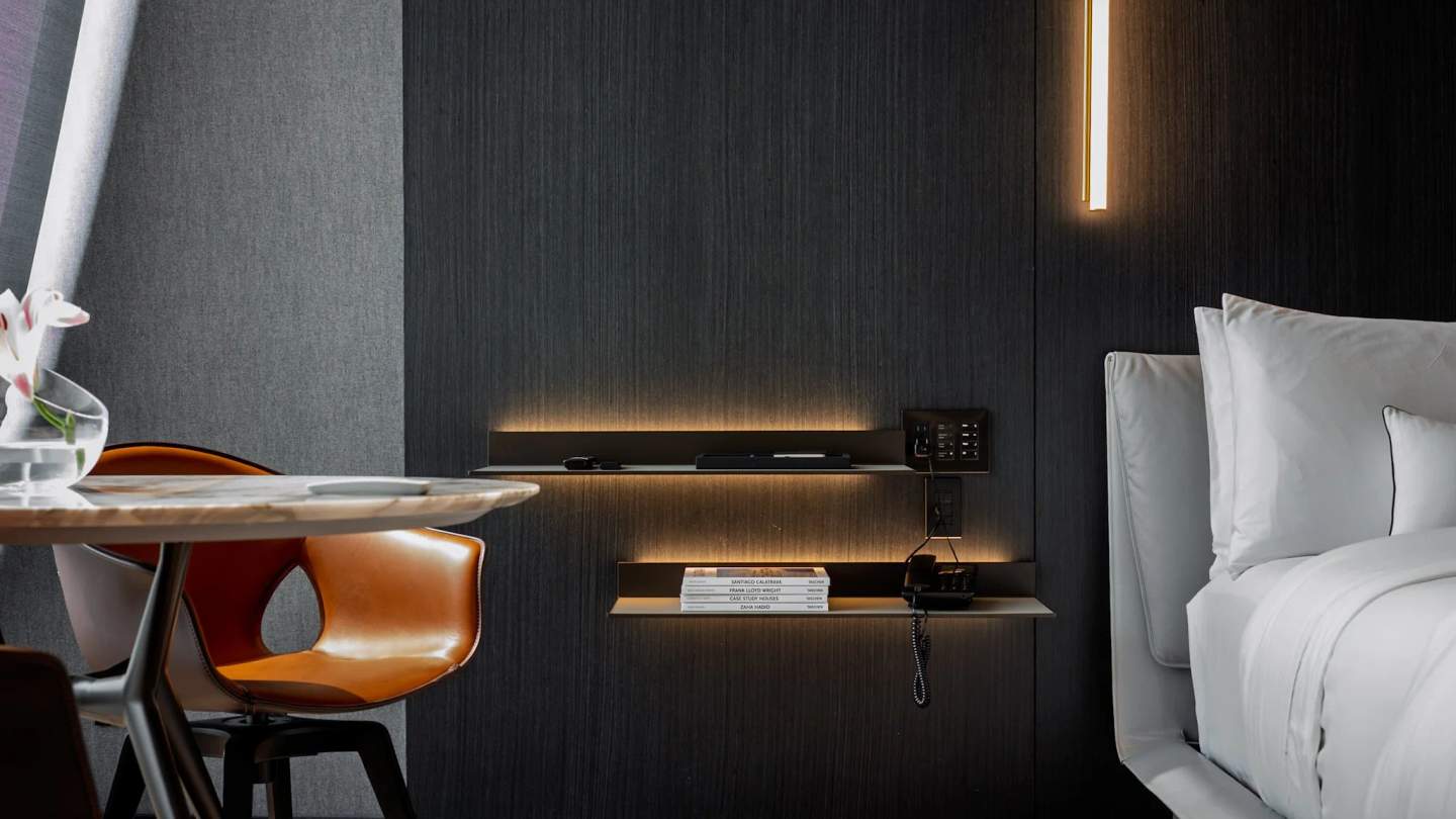 Hotel dining area with ambient evening lighting and carefully styled table settings