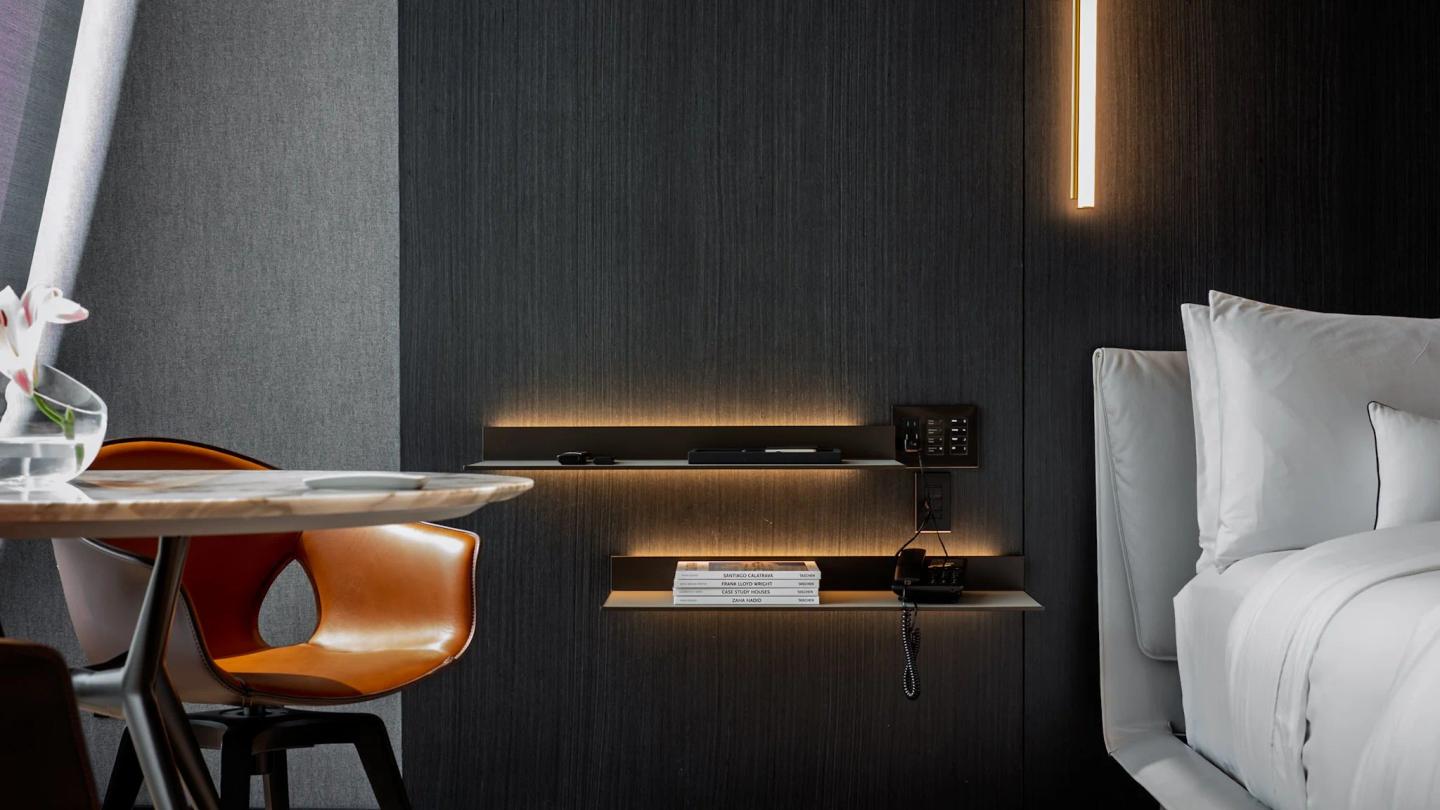 Hotel dining area with ambient evening lighting and carefully styled table settings