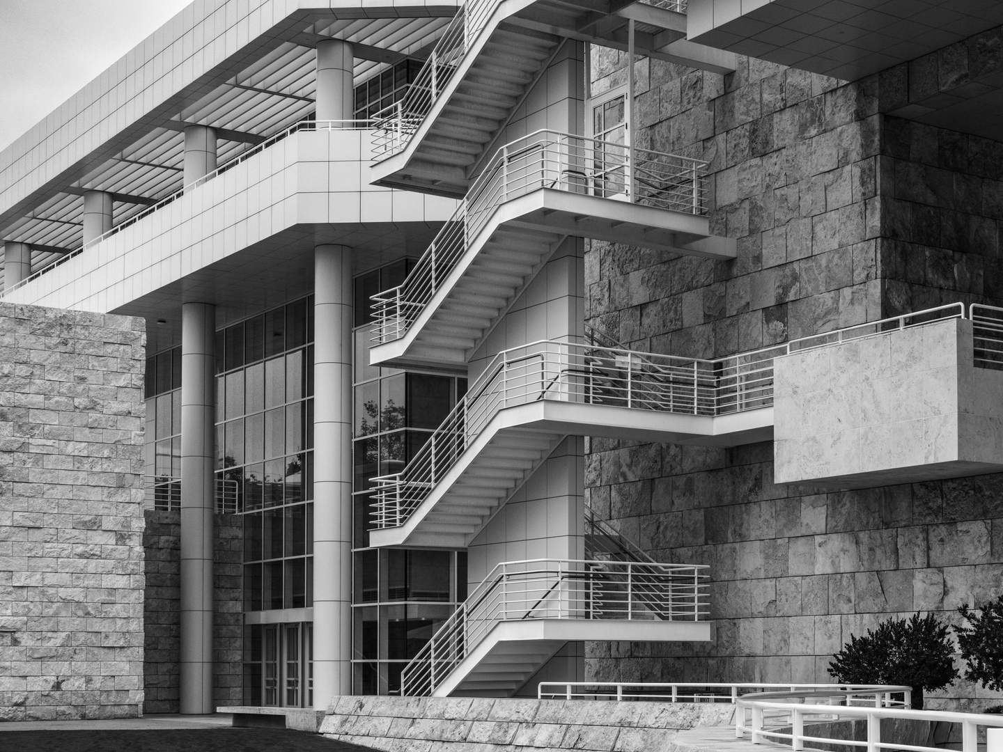 Getty Center staircase and terrace in black and white, formal relationship between diagonal stair, horizontal terrace, and vertical cladding grid as sole subject
