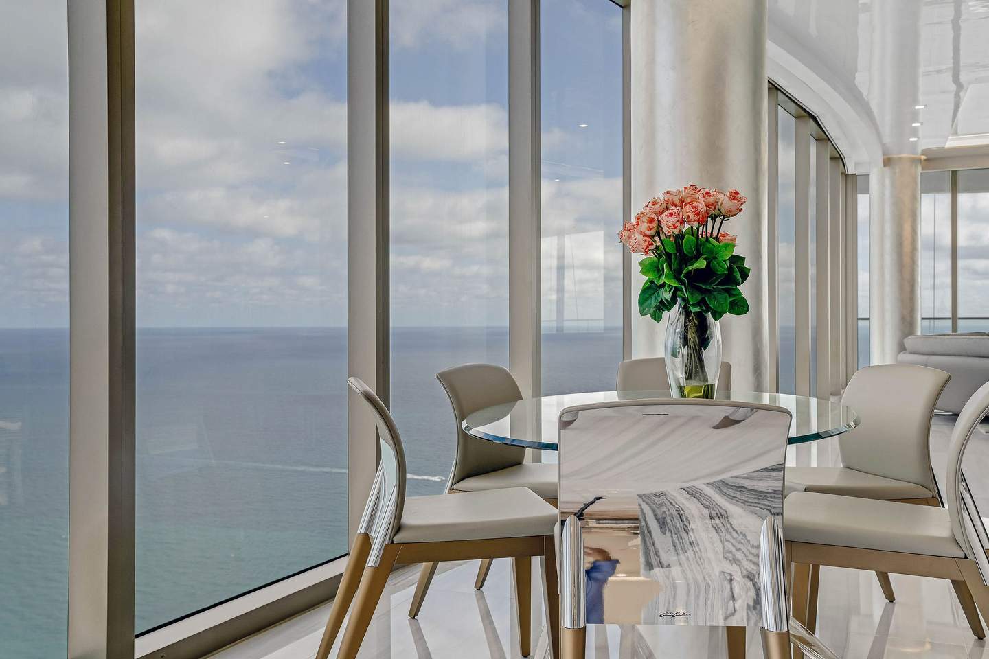 Dining room with ocean views — Estates at Aqualina 4305