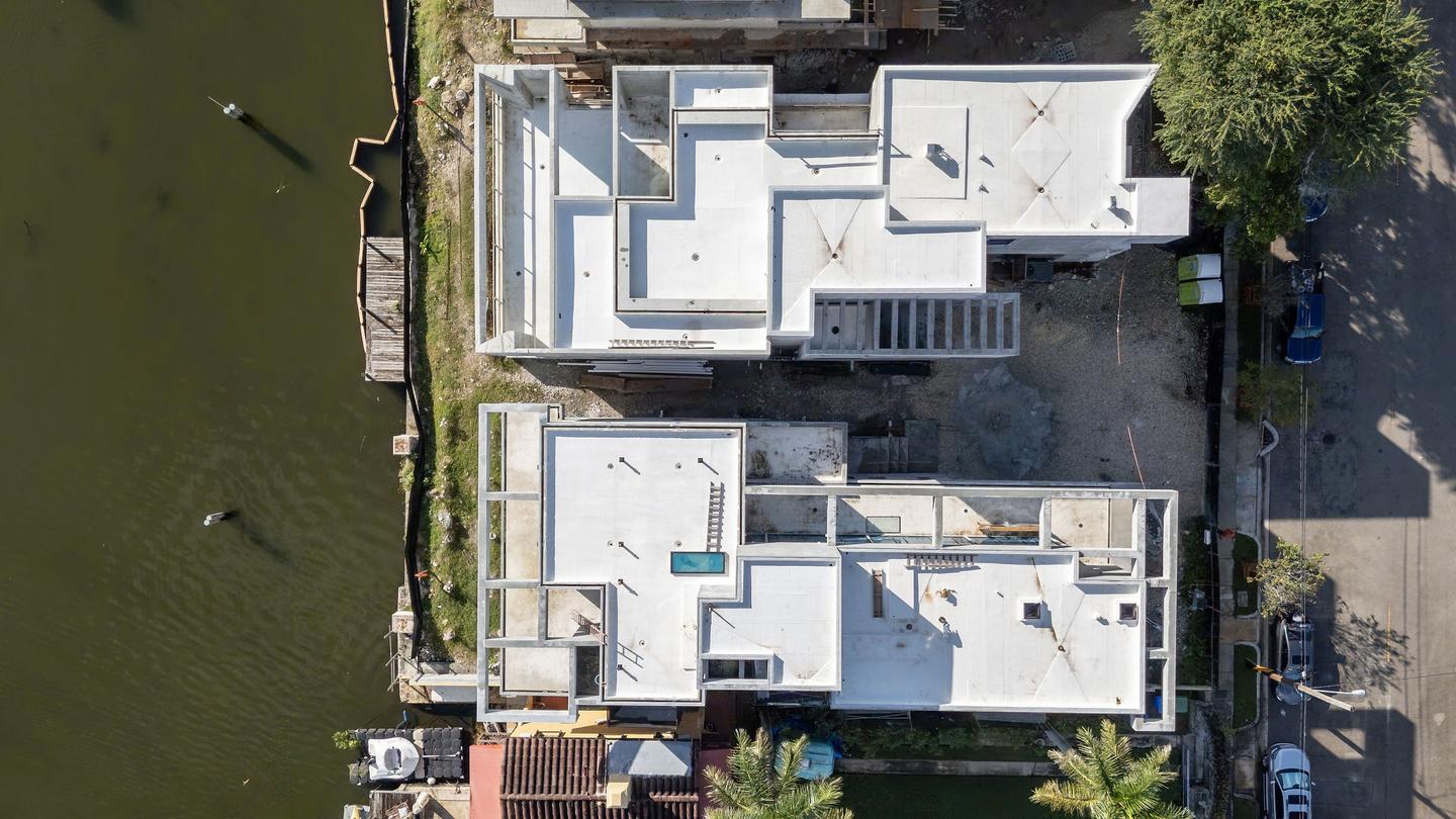 Overhead aerial — rooftop plan showing pool cutout and dual-structure layout